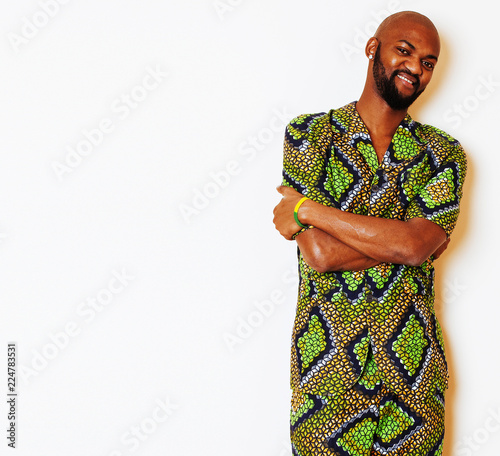 portrait of young handsome african man wearing bright green nati photo