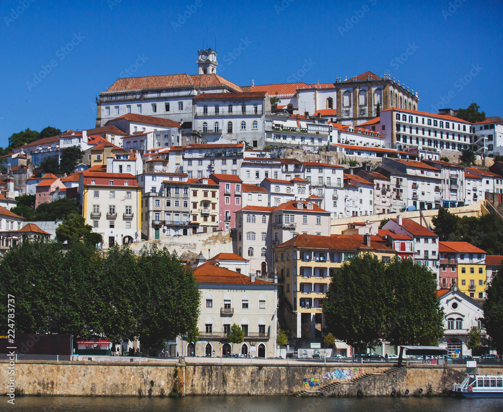 View of Coimbra, city in Portugal, with University of Coimbra, summer sunny day