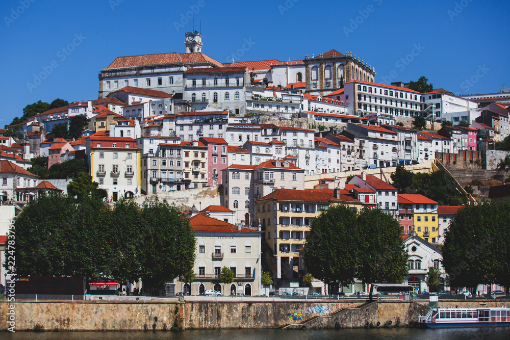 View of Coimbra, city in Portugal, with University of Coimbra, summer sunny day
