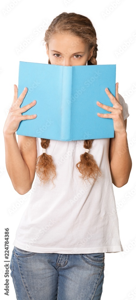 Pretty young woman holding blue book isolated on white Pretty young woman holding blue book isolated on white