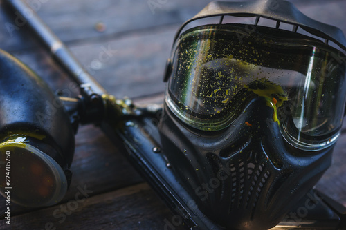 Special protective mask for playing paintball with traces and spot of hit of a ball with paint. 