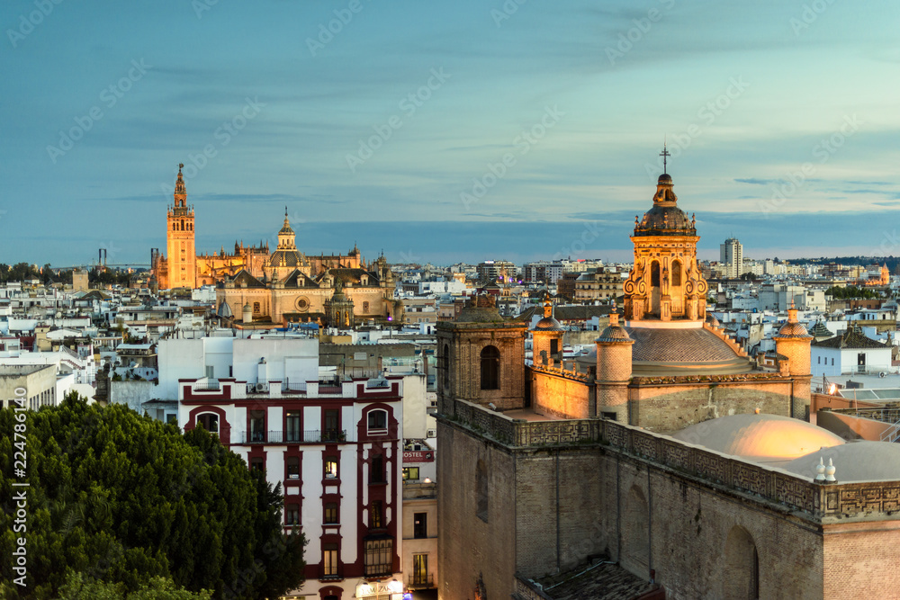 view of the roofs of Seville at sunset in Andalucia, Spain.