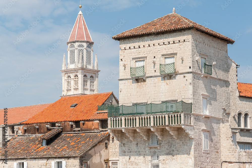 St. Mark Tower and in the background tower of the Church of St. Mikolaj. Croatia, Trogir, sightseeing a great UNESCO World Heritage town during summer days. St. Mark Tower and in the background tower of the Church of St. Mikolaj. Croatia, Trogir, sightseeing a great UNESCO World Heritage town during summer days.