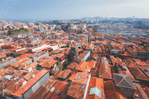 Beautiful super wide-angle summer aerial view of Porto, Norte Portugal region, Portugal, with skyline and scenery beyond the old town, shot from the observation deck of Clerigos church tower