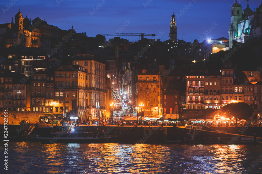 Fototapeta premium Beautiful super wide-angle panoramic summer aerial view of Old Porto Oporto city and Ribeira Square with the old town, during the sunset over Douro river from Vila Nova de Gaia, Porto, Portugal