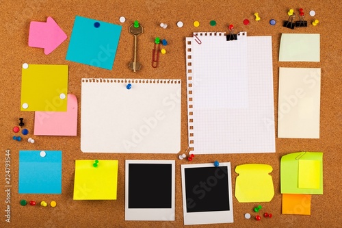 Blank Post It Notes, Photos And Pins On Pinboard Close-up photo