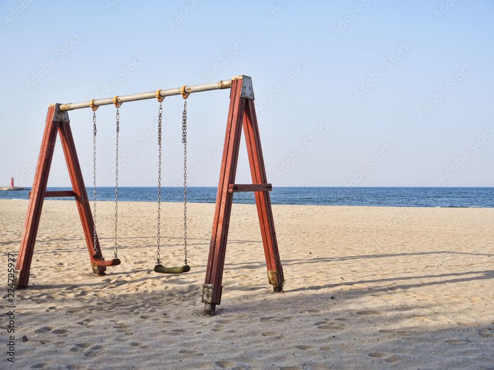 Swings on the beach of Yangyang city, South Korea Swings on the beach of Yangyang city, South Korea