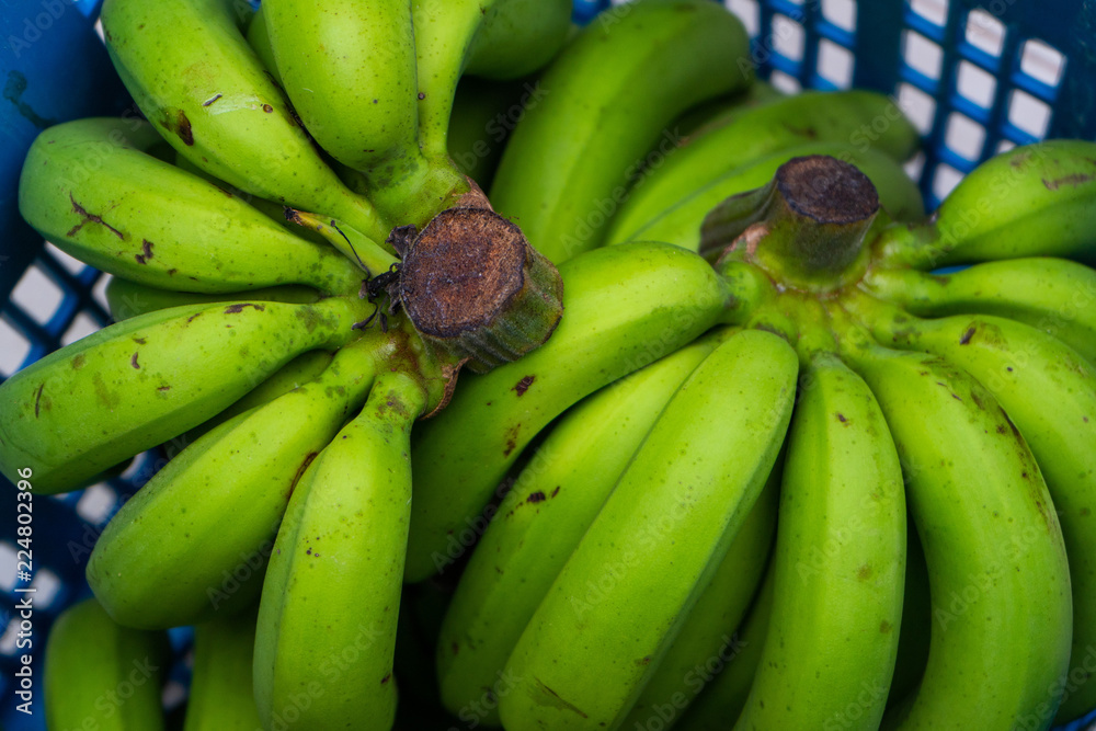 Fresh banana on plastic basket