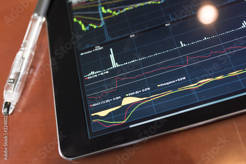 Stock graph with tablet photo