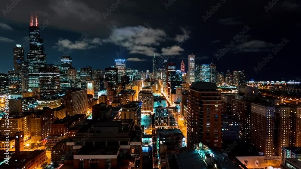 Time-lapse of the Chicago skyline at night with skycrapers