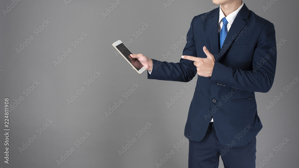 Close up of business man is using tablet