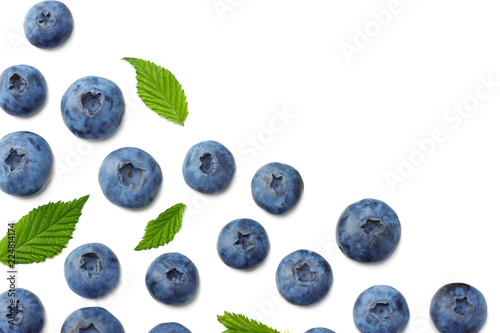 healthy background. blueberries with leaves isolated on white background. top view
