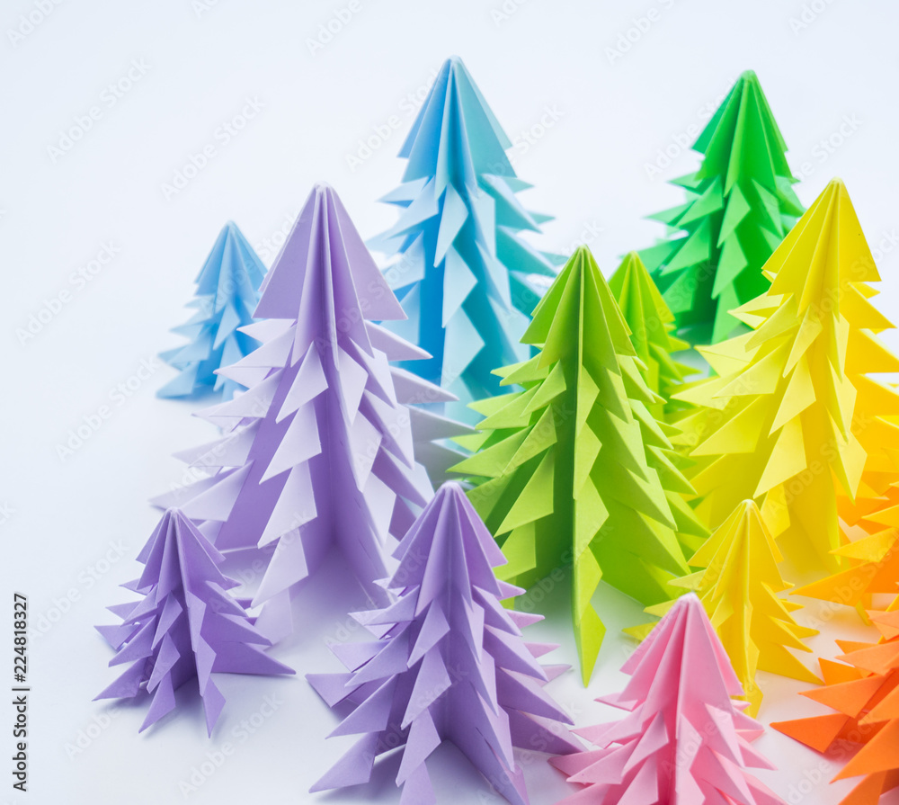 Fototapeta premium Multicolored paper Christmas tree white background