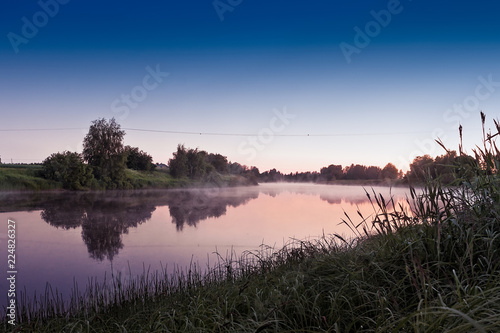 Mist over the river water on a Summer Night