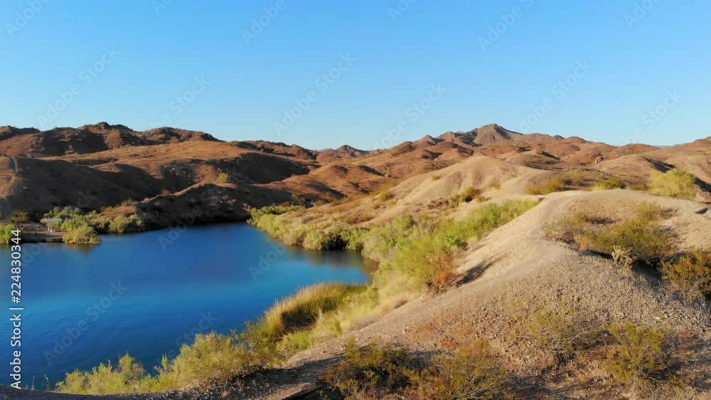 Aerial: Calm Lake and Desert Mountain Range Aerial: Calm Lake and Desert Mountain Range
