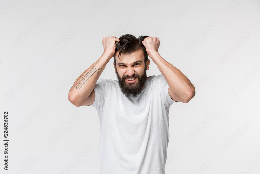 I won. Winning success happy man celebrating being a winner. Dynamic image of caucasian male model on white studio background. Victory, delight concept. Human facial emotions concept. I won. Winning success happy man celebrating being a winner. Dynamic image of caucasian male model on white studio background. Victory, delight concept. Human facial emotions concept.