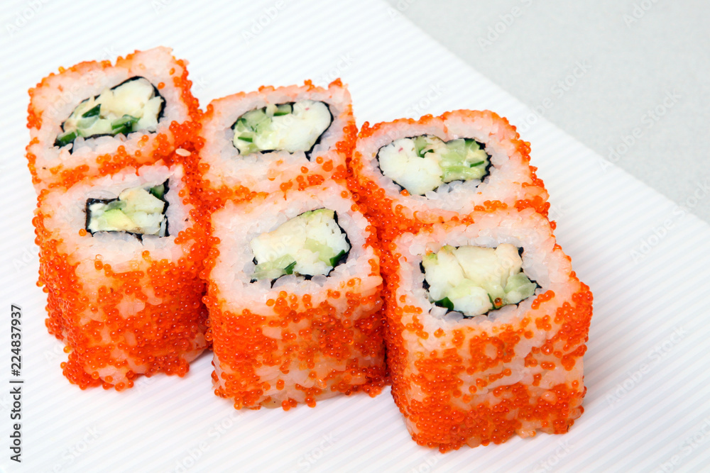 Sushi. Rolls with shrimp. Roll California with avocado. Japanese food. Healthy food is nicely laid out on a platter. Sushi. Rolls with shrimp. Roll California with avocado. Japanese food. Healthy food is nicely laid out on a platter.