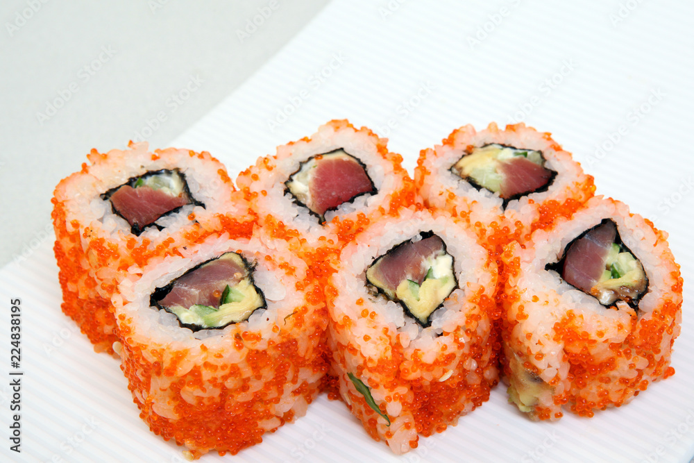 Sushi. Rolls with shrimp. Roll California with avocado. Japanese food. Healthy food is nicely laid out on a platter. Sushi. Rolls with shrimp. Roll California with avocado. Japanese food. Healthy food is nicely laid out on a platter.
