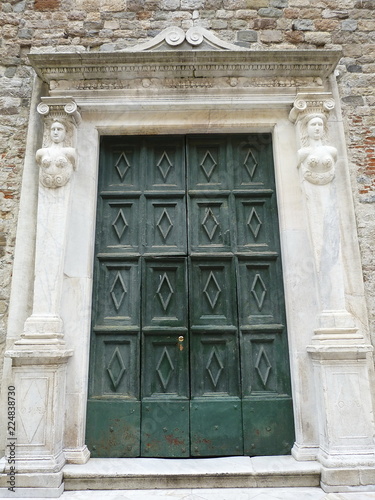 Foto Italy, Sarzana, portal of the parish of St  Andrew