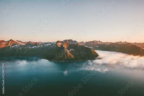 Mountains and sea fjord sunset landscape in Norway aerial view Travel vacations tranquil scenery Senja islands