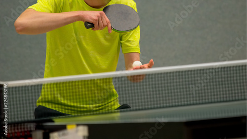 Table Tenns Player serving