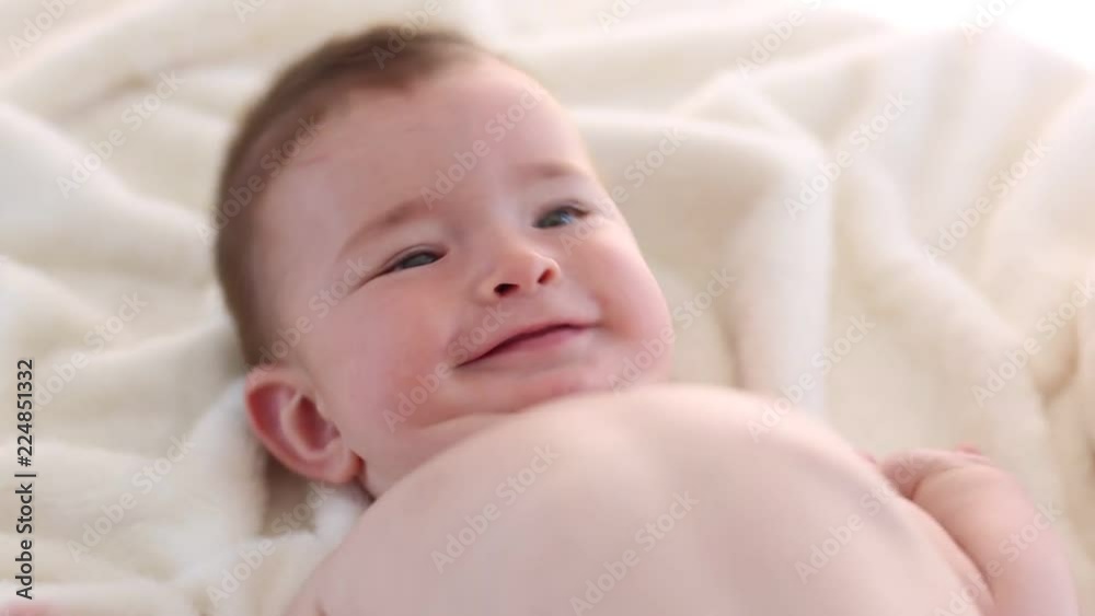 Little baby boy is smiling to the camera. How cute little one. Little baby boy is smiling to the camera. How cute little one.