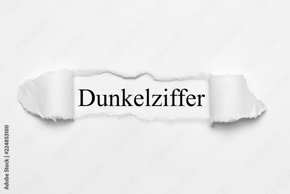 Dunkelziffer auf weißen gerissenen Papier Dunkelziffer auf weißen gerissenen Papier