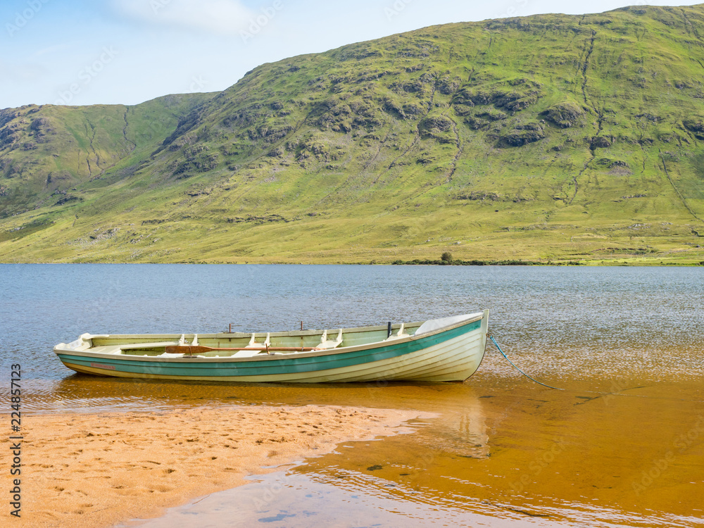 A Boat on the Beach at Lake Nafooey in Ireland