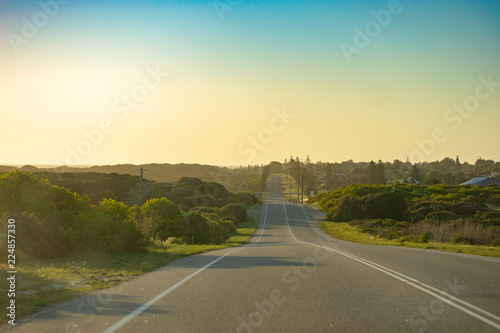 Road trip at sunset horizon