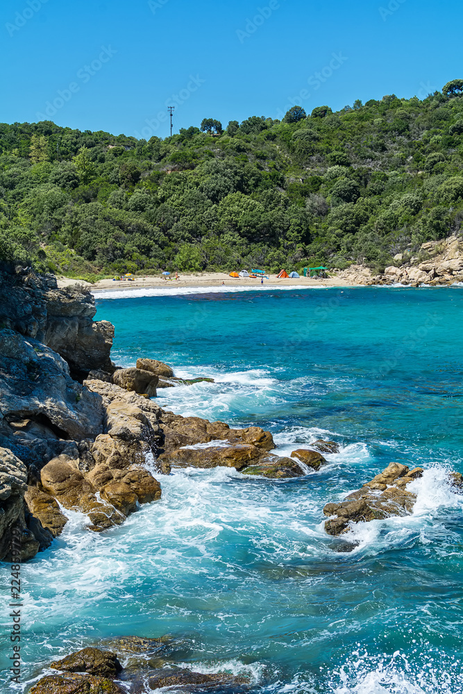 Fototapeta premium Olympiada, Greece - August 11, 2018: Proti Ammoudia beach, one of the most beautiful beaches in the Aegean Sea.
