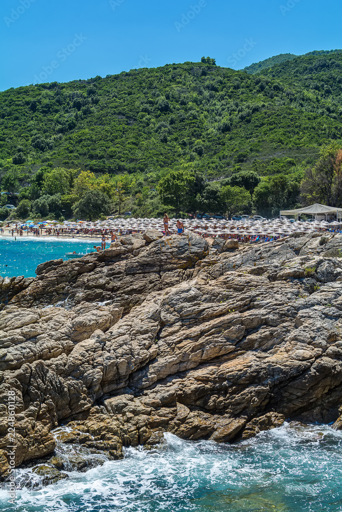Fototapeta premium Olympiada, Greece - August 11, 2018: Proti Ammoudia beach, one of the most beautiful beaches in the Aegean Sea.