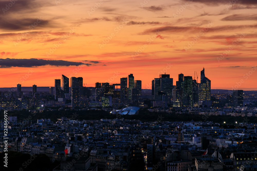Aerial view of skyscrapers of Paris in sunset