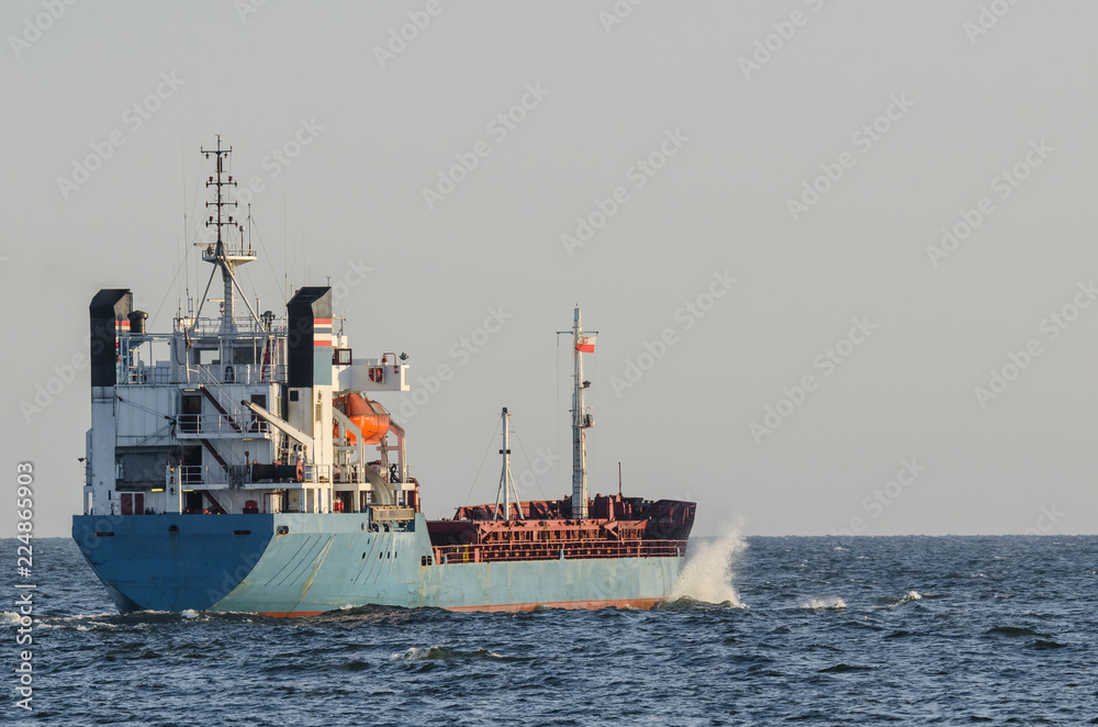 GENERAL CARGO SHIP - The freighter flows by waterway