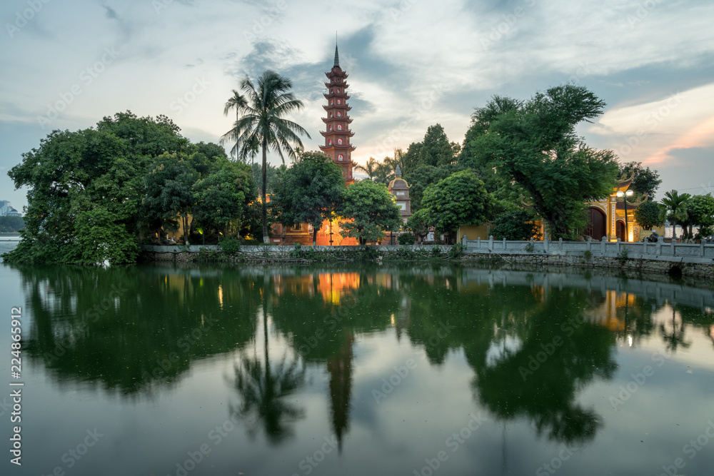 Tran Quoc pagoda during sunset time, the oldest temple in Hanoi, Vietnam. Hanoi cityscape. Tran Quoc pagoda during sunset time, the oldest temple in Hanoi, Vietnam. Hanoi cityscape.