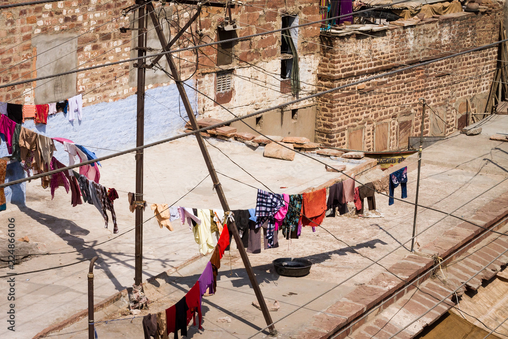 Looking down on washing line filled with clothes in Jodhpur