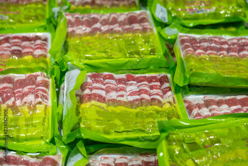 Raw beef meat in plastic box in supermarket