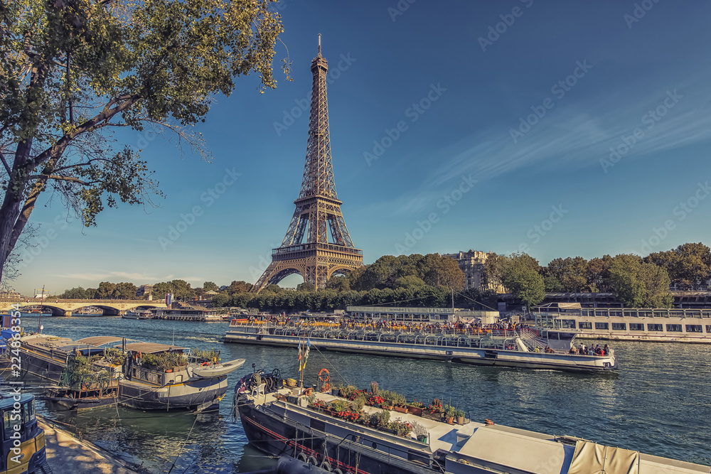 Eiffel Tower in Paris in tourist season