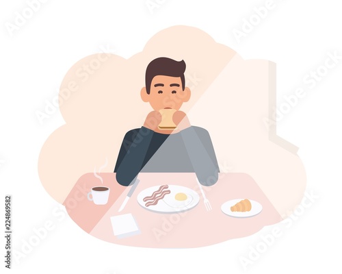 Happy young man sitting at table and eating delicious morning meal. Male character having breakfast at home. Smiling boy chewing sandwich. Colorful vector illustration in flat cartoon style.