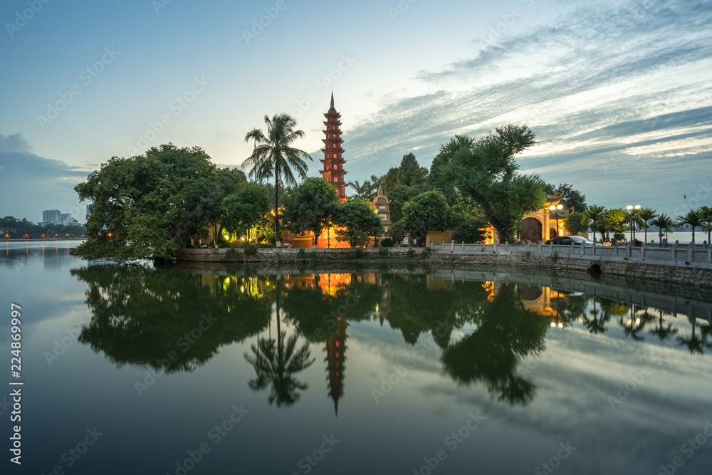 Tran Quoc pagoda during sunset time, the oldest temple in Hanoi, Vietnam. Hanoi cityscape. Tran Quoc pagoda during sunset time, the oldest temple in Hanoi, Vietnam. Hanoi cityscape.