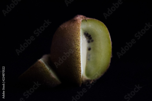kiwi on black background
