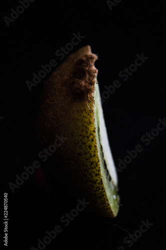 kiwi on black background