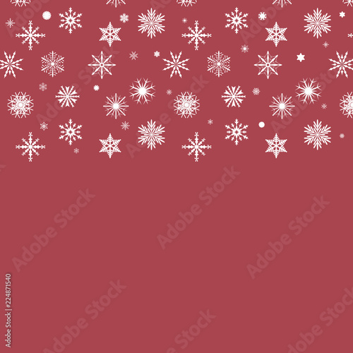 Schneeflocken auf rotem Hintergrund