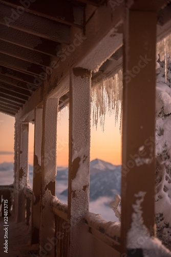 Icicles hanging off a building in the mountains - Washington state