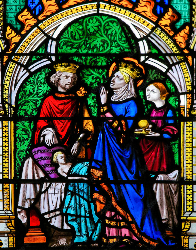 King and Queen praying for their son to heal - stained glass in Rouen