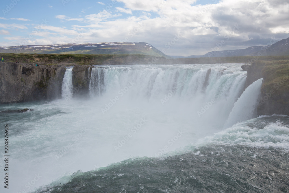 waterfall in iceland in the mountain