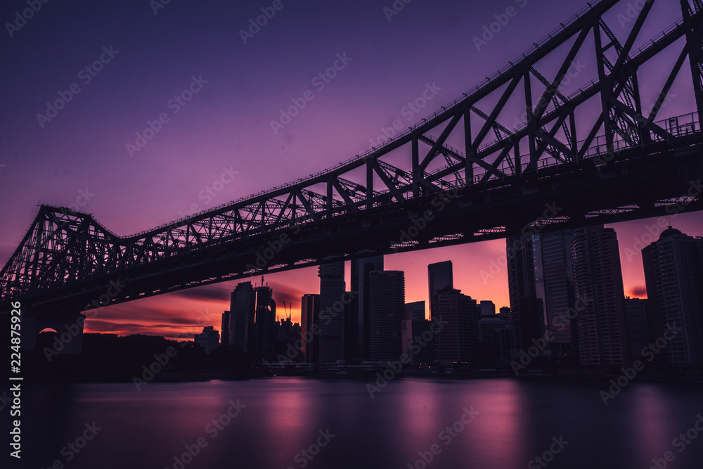 Railway bridge in dark sunset light