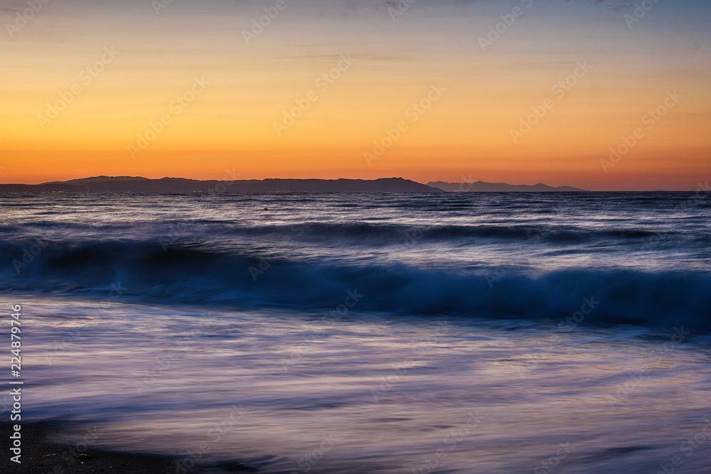 Naklejka premium Early morning , dramatic sunrise over sea. Photographed in Asprovalta, Greece.