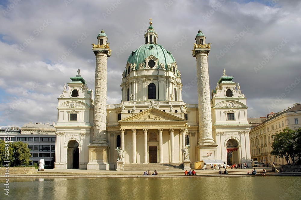View of Karlskirche, St. Charles Church, a baroque church located on the south side of Karlsplatz in Vienna, Austria.