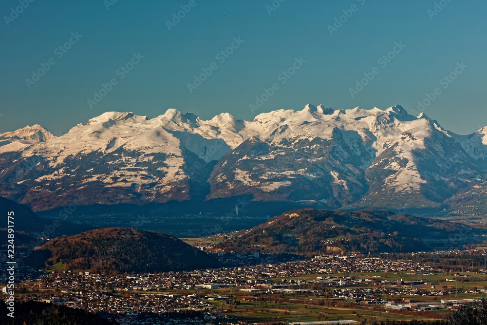 Feldkirch, Rhine valley, Austria - sunrise over Rhine valley with snowy peaks of  Apenzell Alps in Switzerland