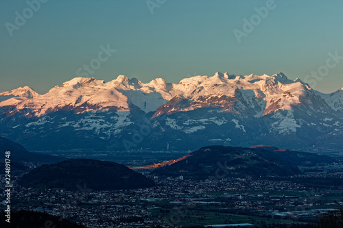 Feldkirch, Rhine valley, Austria - sunrise over Rhine valley with snowy peaks of  Apenzell Alps in Switzerland photo